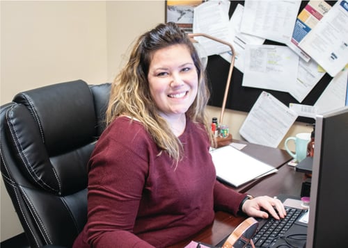 Employee working at her desk